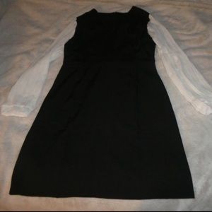 Black (with white long sleeves) dress